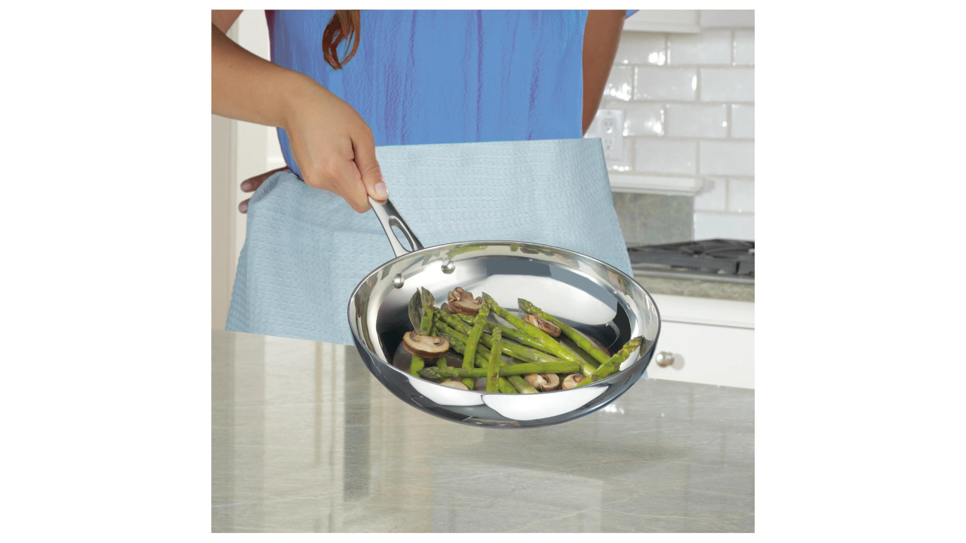 Stainless Steel pan with asparagus and mushrooms